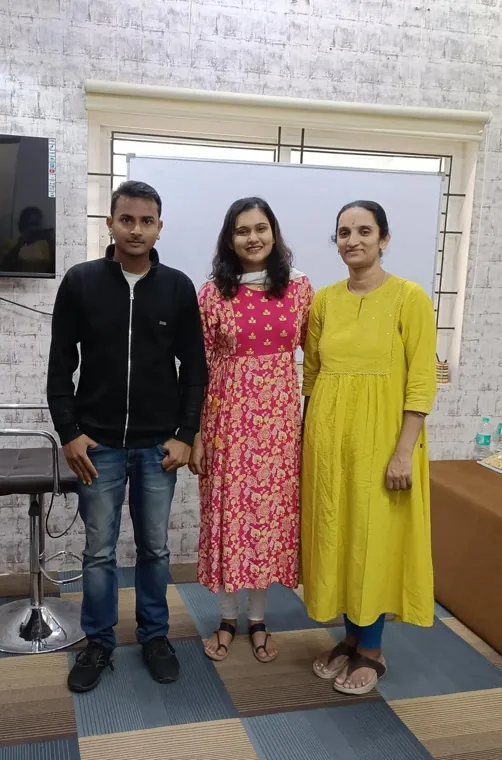 Trainer with two participants after a session
